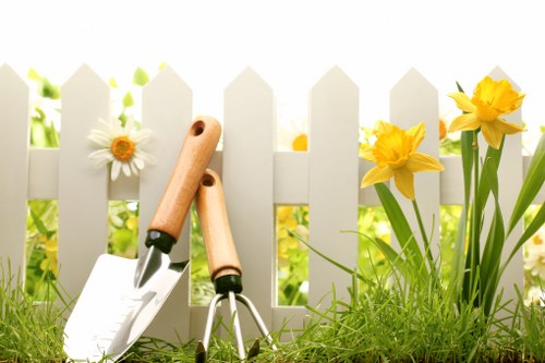 Lush green lawn cared for by Harrow garden professionals